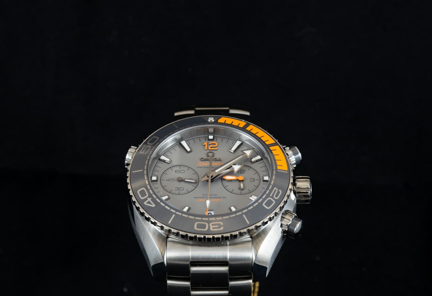 Diver's watch with a grey ceramic bezel on black